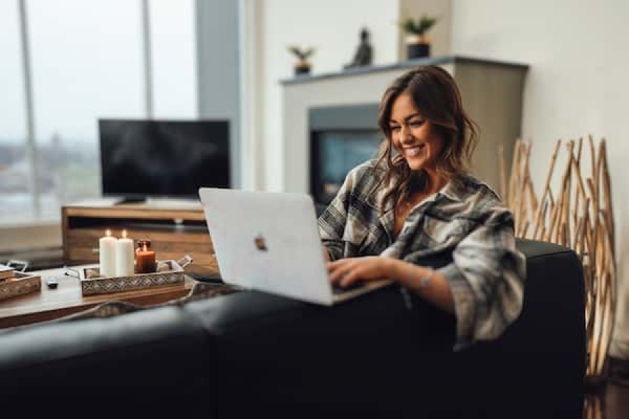 Professional working from a furnished corporate apartment in Canada