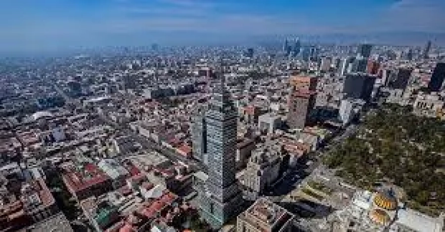 Mexico City skyline representing corporate housing Mexico nearshoring relocation demand
