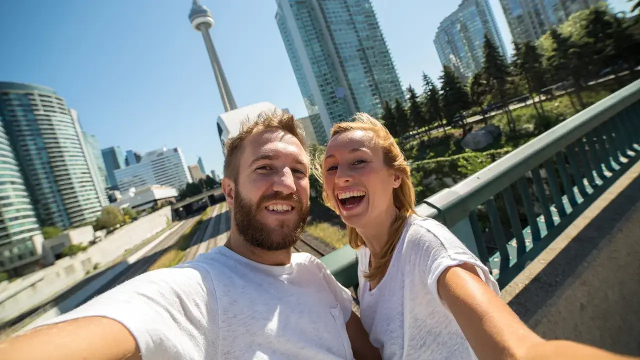 unmatched support from corporate housing team with a satisfied client in front of her laptop df09c6d9